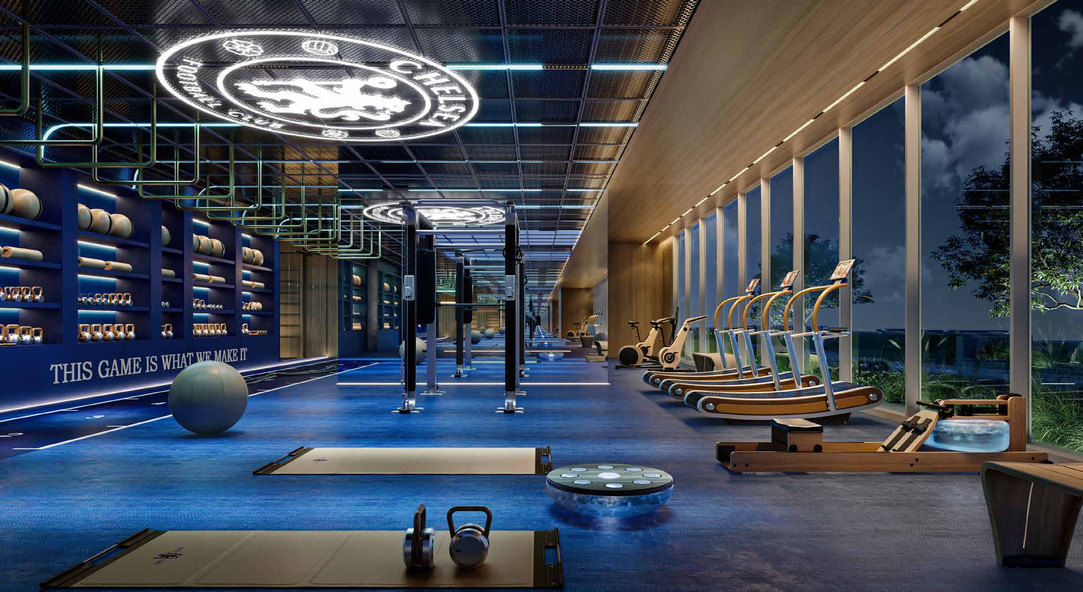 Training centre with treadmills, rowers and racks beside tall windows